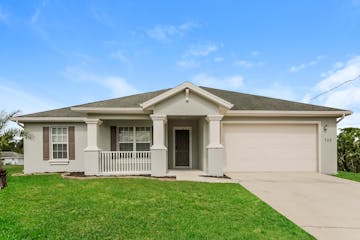 702 Yvonne AVE N Lehigh Acres, FL 33971